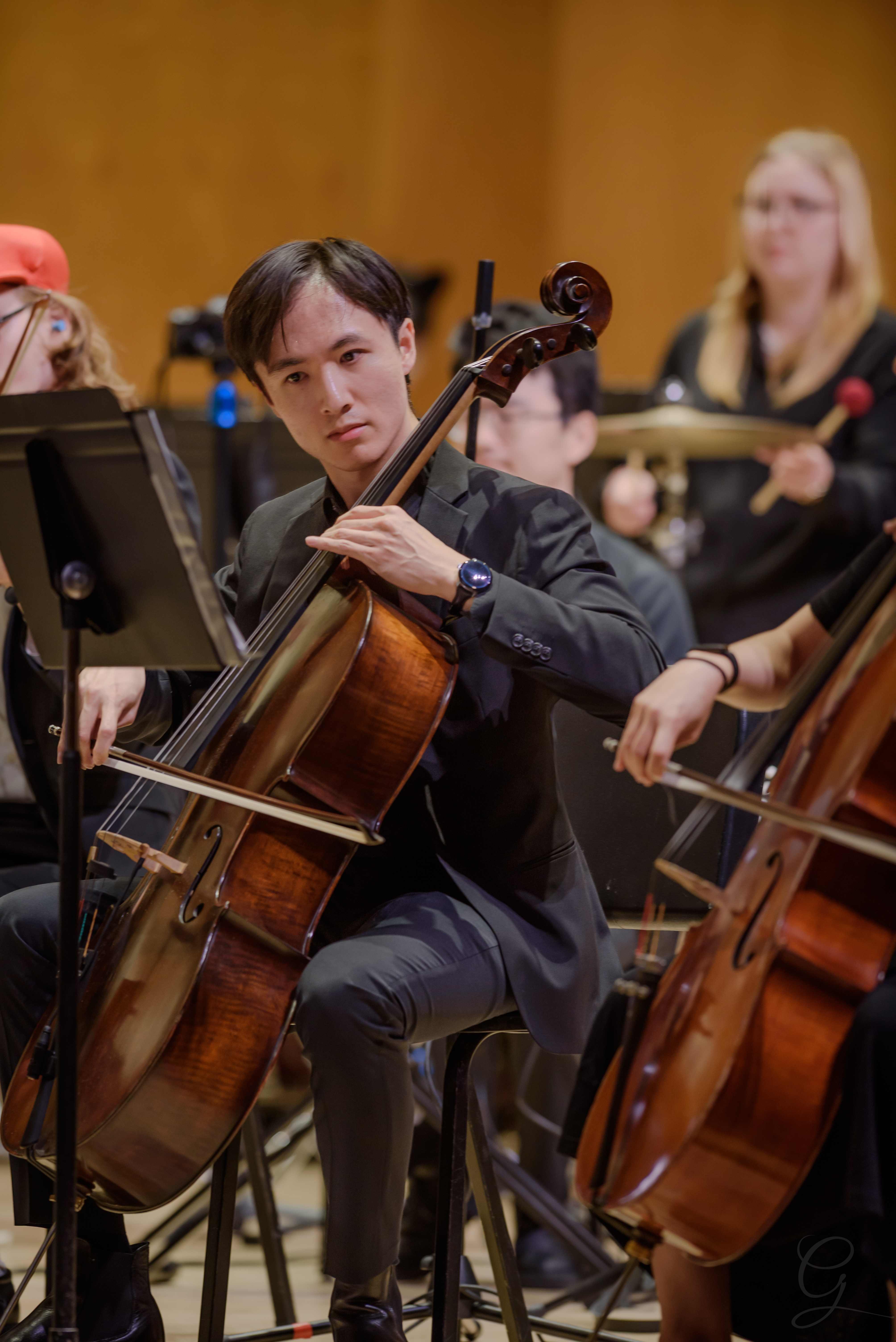 Cellist performing with the GG Orchestra