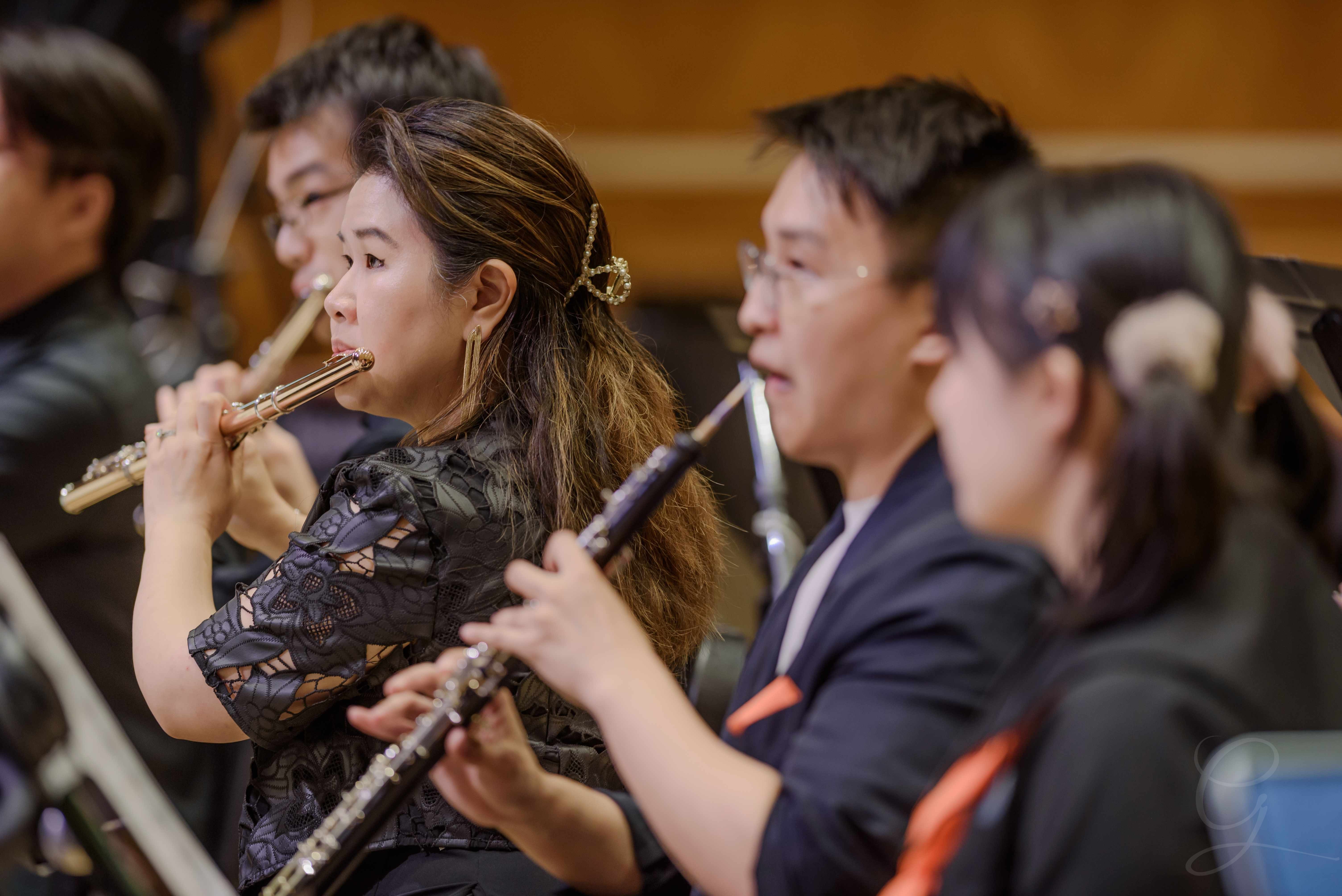 Flute section performing together during a GG Orchestra concert