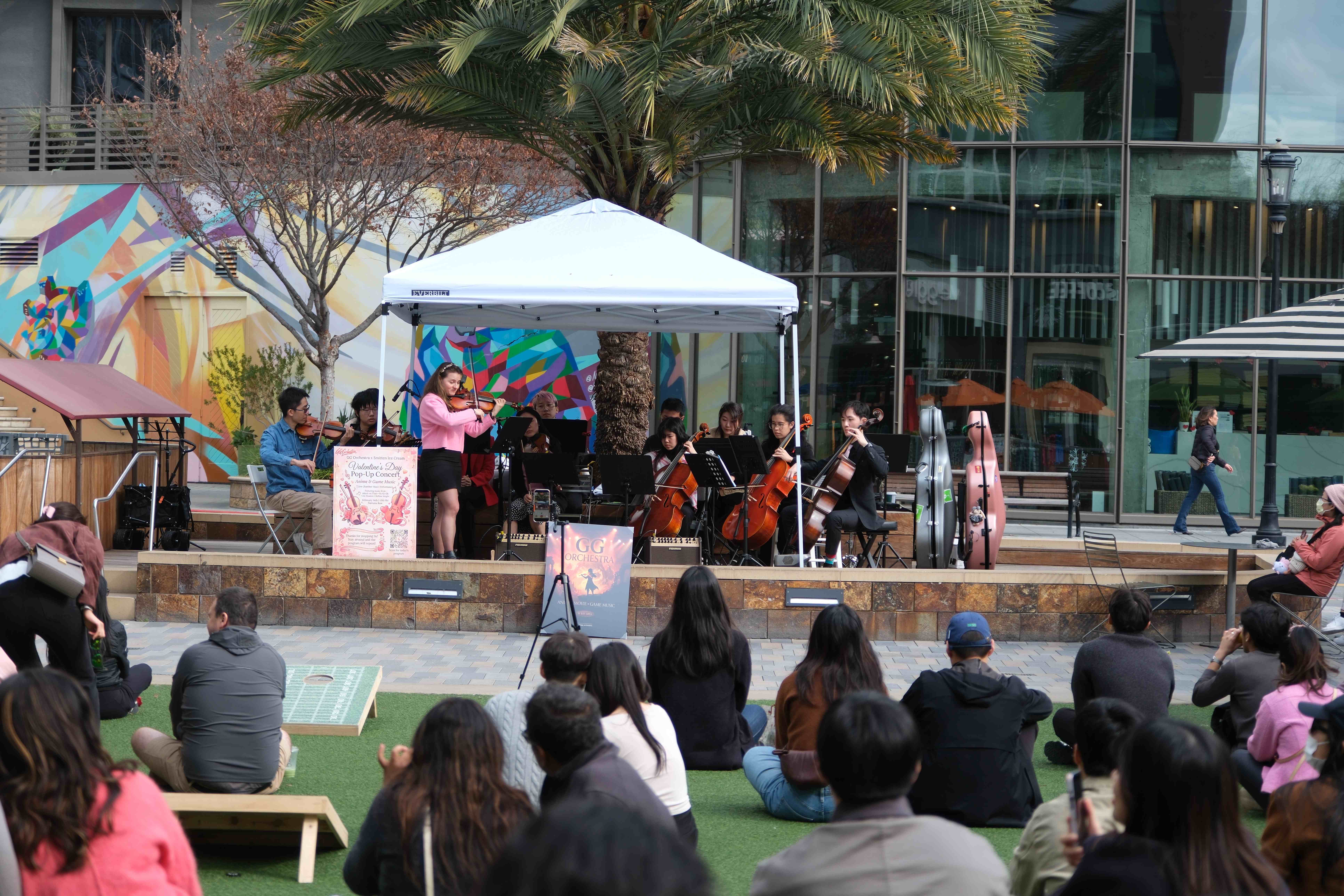 The GG Orchestra performing at an outdoor pop-up community concert